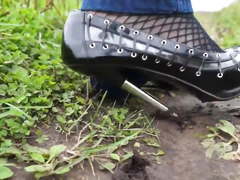 Ultra high heels bend and stuck in mud